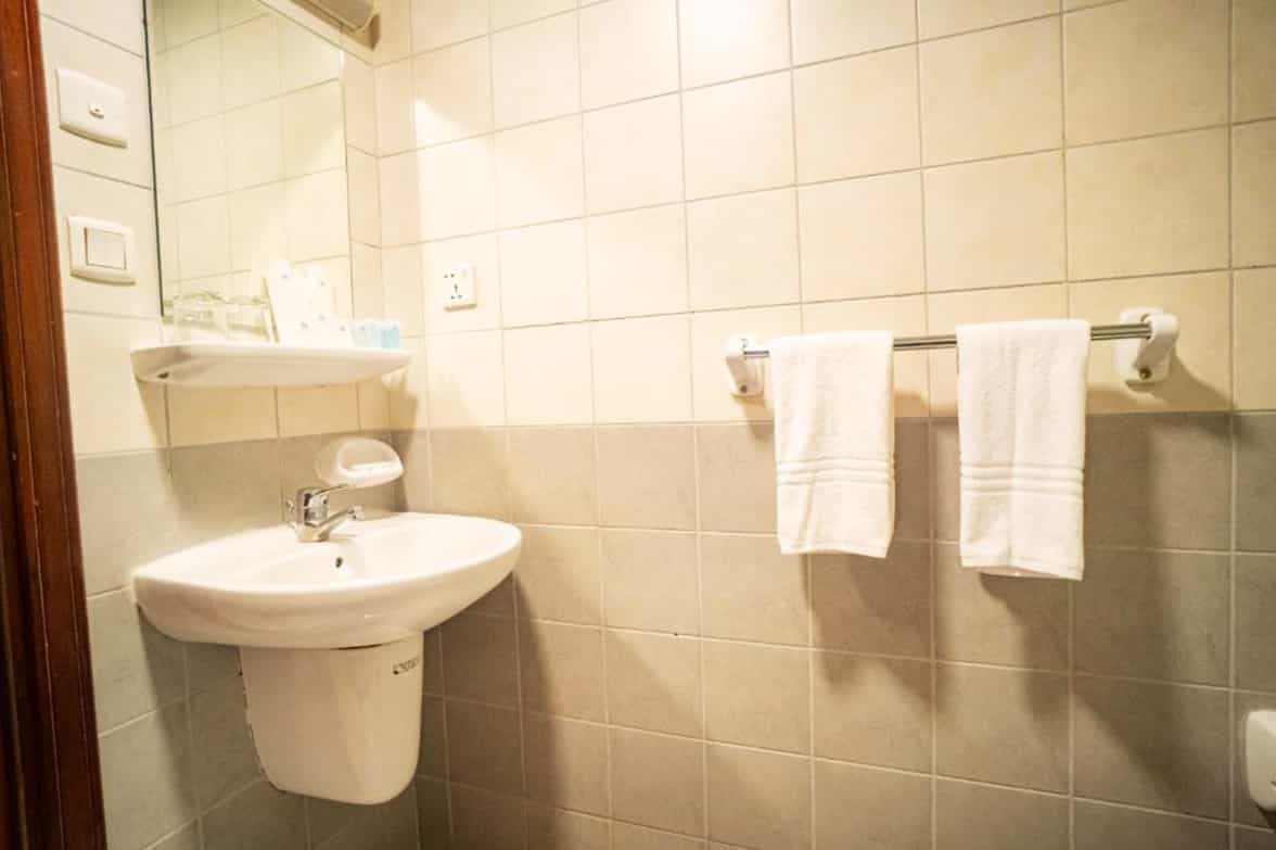 Pedestal Sink In Hotel Bathroom