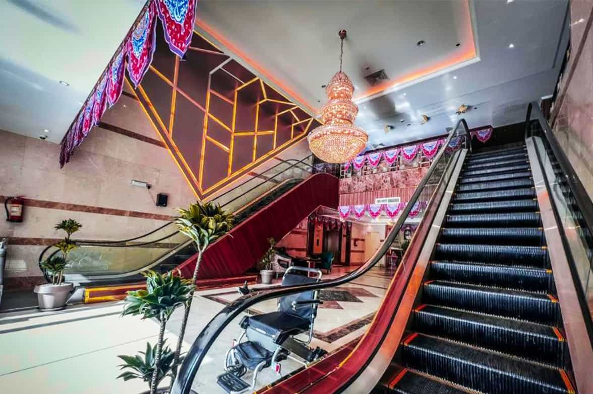 Lavish Escalators Chandeliers View